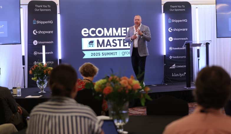 Ethan Giffin speaking at the Blueprint Summit on stage