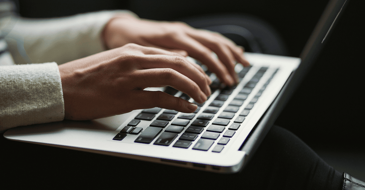 B2B eCommerce Email Orders Woman Typing on Laptop